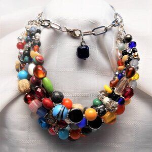 No449 Handmade necklace with rows of polished stones, glass crystals, shells etc
